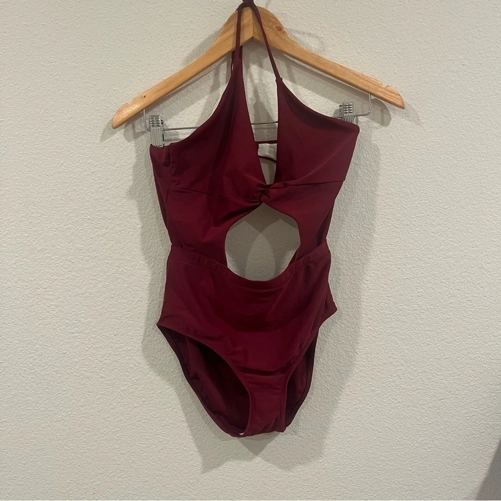 6 Shore Road maroon one piece with cut out and tie neck size medium